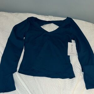 Teal/dark blue Athleta long sleeve never worn with tags